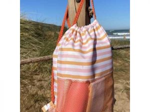 MOCHILA SACO CORAL Y MOSTAZA